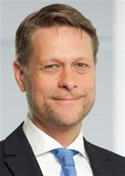 Man sieht ein Portät von Herrn Wolfgang Doerfler, dem Managing Director von DDI Deutschland, Polen und Russland